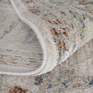 HomeRoots 5' Blue Taupe and Ivory Ikat Distressed Area Rug with Fringed Tassels for Chic Home Decor Style 7' X 10' 567562