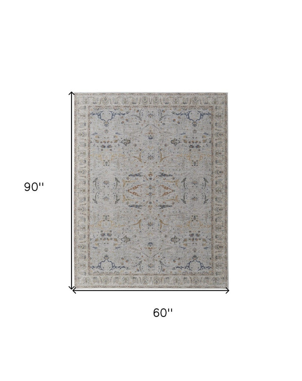 HomeRoots 5' Blue Taupe and Ivory Ikat Distressed Area Rug with Fringed Tassels for Chic Home Decor Style 5' X 8' 567566