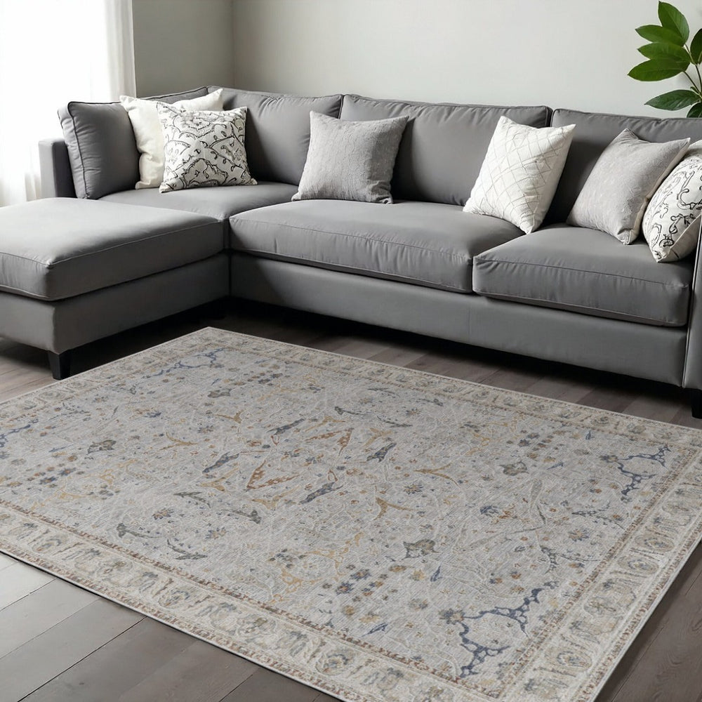 HomeRoots 5' Blue Taupe and Ivory Ikat Distressed Area Rug with Fringed Tassels for Chic Home Decor Style 7' X 10' 567567