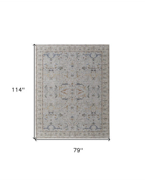 HomeRoots 5' Blue Taupe and Ivory Ikat Distressed Area Rug with Fringed Tassels for Chic Home Decor Style 7' X 10' 567567