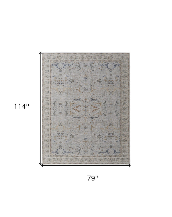 HomeRoots 5' Blue Taupe and Ivory Ikat Distressed Area Rug with Fringed Tassels for Chic Home Decor Style 7' X 10' 567567