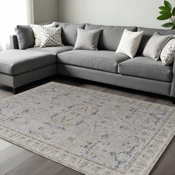HomeRoots 5' Blue Taupe and Ivory Ikat Distressed Area Rug with Fringed Tassels for Chic Home Decor Style 8' X 10' 567568