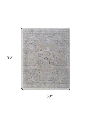 Homeroots 5' X 8' Ivory Taupe And Blue Oriental Power Loom Worn Faded Area Rug With Fringe Ivory Polyester 567571