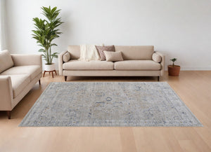 Homeroots 8' X 10' Ivory Taupe And Blue Oriental Power Loom Worn Faded Area Rug With Fringe Ivory Polyester 567573