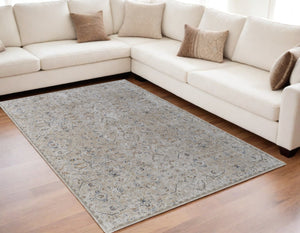 HomeRoots 5' Ivory Taupe and Blue Abstract Area Rug - Power Loomed with Fringed Tassels for Modern Style 5' X 8' 567576
