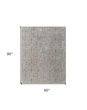 HomeRoots 5' Ivory Taupe and Blue Abstract Area Rug - Power Loomed with Fringed Tassels for Modern Style 5' X 8' 567576