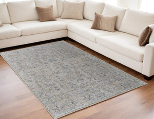 HomeRoots 5' Modern Abstract Ivory Tan and Blue Area Rug with Fringe – Durable, Stylish, and Easy Care 5' X 8' 567581
