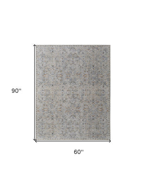 HomeRoots 5' Modern Abstract Ivory Tan and Blue Area Rug with Fringe – Durable, Stylish, and Easy Care 5' X 8' 567581