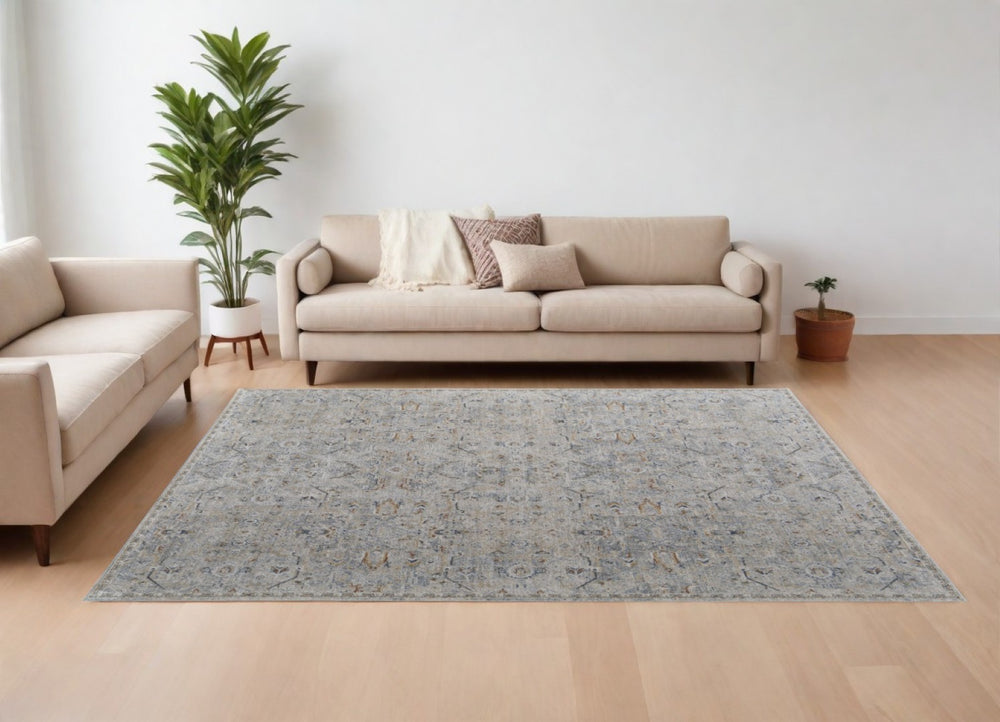 HomeRoots 5' Modern Abstract Ivory Tan and Blue Area Rug with Fringe – Durable, Stylish, and Easy Care 9' X 13' 567584