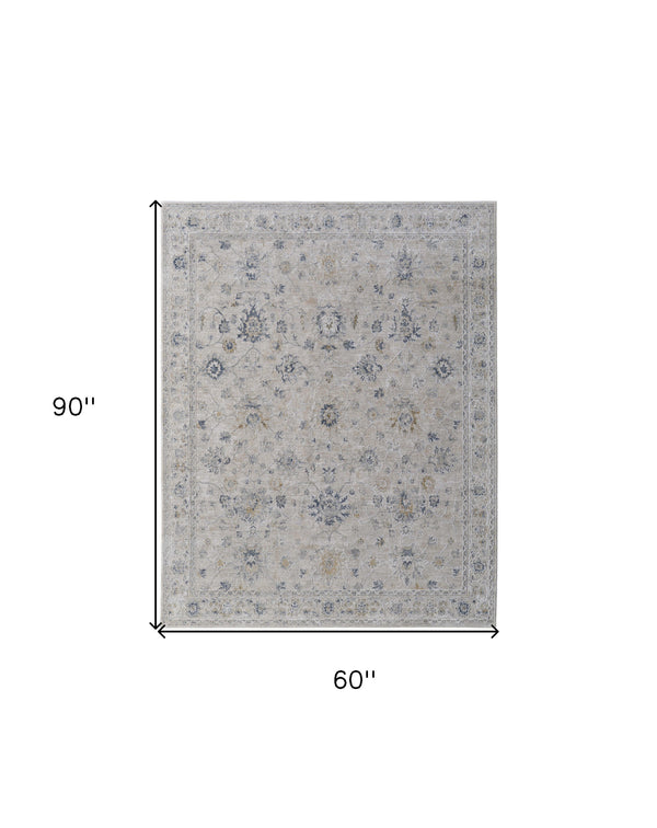 Homeroots 5' X 8' Ivory Taupe And Blue Floral Power Loom Worn Faded Area Rug With Fringe Ivory Polyester 567586