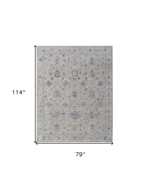 Homeroots 7' X 10' Ivory Taupe And Blue Floral Power Loom Worn Faded Area Rug With Fringe Ivory Polyester 567587