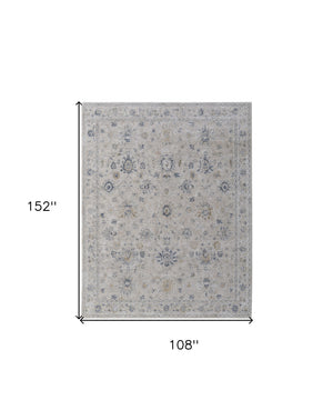 Homeroots 9' X 13' Ivory Taupe And Blue Floral Power Loom Worn Faded Area Rug With Fringe Ivory Polyester 567589