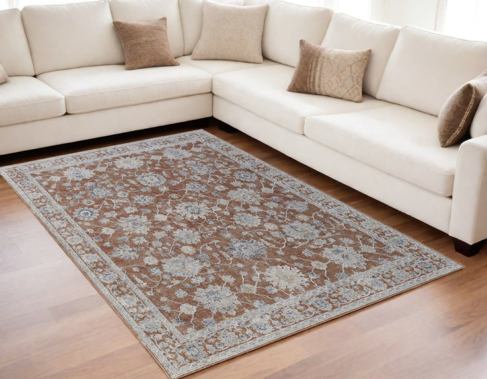 HomeRoots 5' Vintage-Inspired Floral Area Rug with Fringe - Worn Red, Blue & Ivory Design for Timeless Elegance 5' X 8' 567591