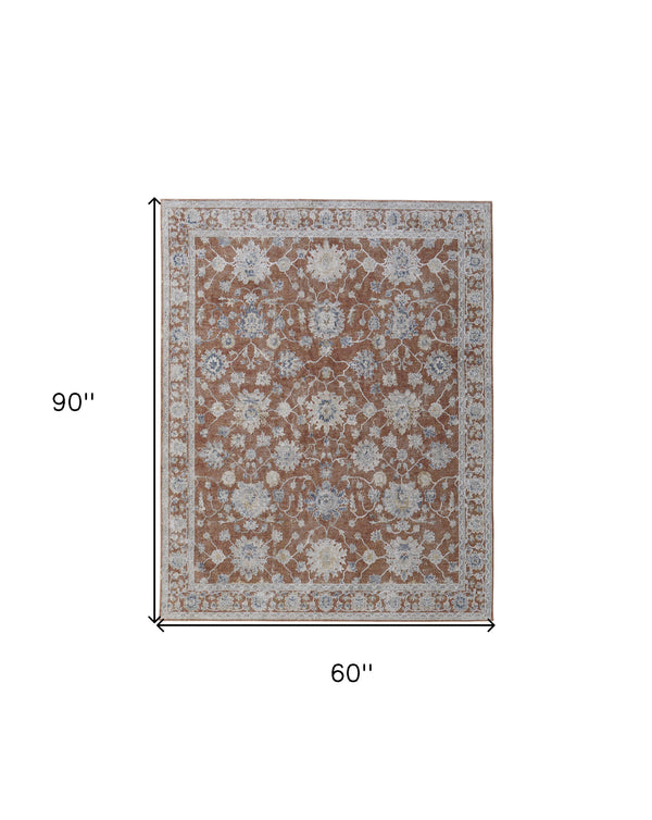 Homeroots 5' X 8' Red Blue And Ivory Floral Power Loom Worn Faded Area Rug With Fringe Red Polyester 567591