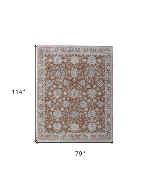 Homeroots 7' X 10' Red Blue And Ivory Floral Power Loom Worn Faded Area Rug With Fringe Red Polyester 567592