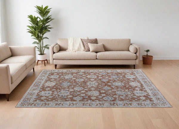 Homeroots 8' X 10' Red Blue And Ivory Floral Power Loom Worn Faded Area Rug With Fringe Red Polyester 567593