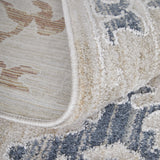 Homeroots 5' X 8' Ivory Blue And Gold Floral Power Loom Worn Faded Area Rug With Fringe Ivory Polyester 567595