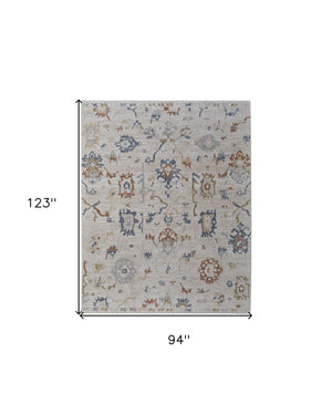 Homeroots 8' X 10' Ivory Blue And Gold Floral Power Loom Worn Faded Area Rug With Fringe Ivory Polyester 567597