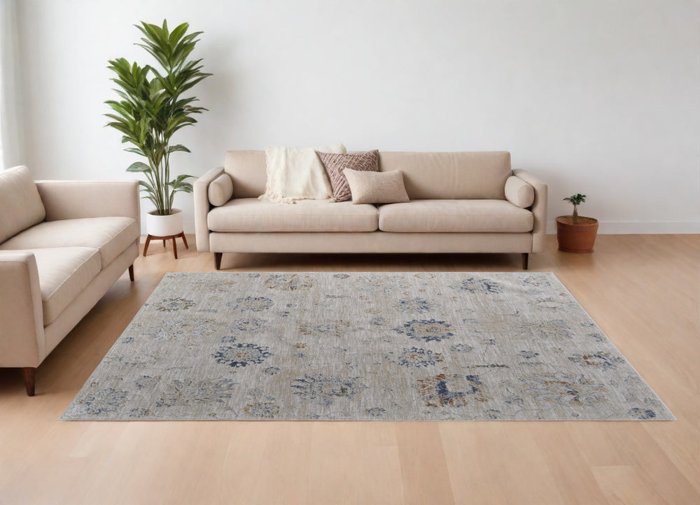 Homeroots 8' X 10' Ivory Taupe And Blue Floral Power Loom Worn Faded Area Rug With Fringe Taupe Polyester 567602