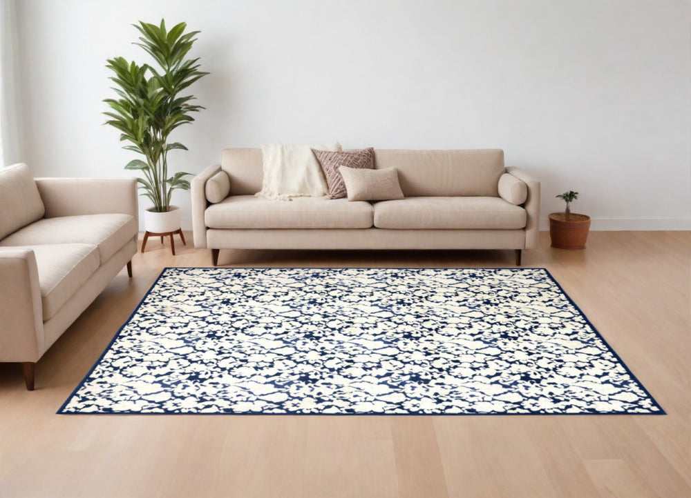 HomeRoots 10' Blue and Ivory Abstract Power Loom Area Rug – Durable, Stylish Design for Everyday Living Spaces 10' X 13' 567692