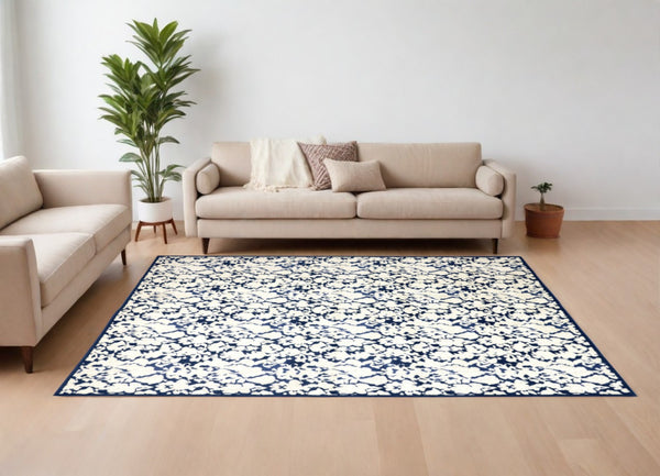 HomeRoots 10' Blue and Ivory Abstract Power Loom Area Rug – Durable, Stylish Design for Everyday Living Spaces 10' X 13' 567692