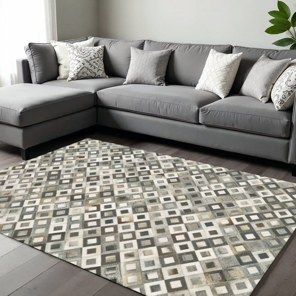 HomeRoots 6' Luxe Faux Cowhide Geometric Area Rug in Black, Gray, and White - Modern Style for Any Space 6' X 9' 567699