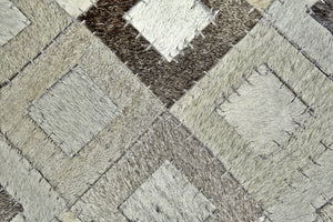 HomeRoots 6' Luxe Faux Cowhide Geometric Area Rug in Black, Gray, and White - Modern Style for Any Space 6' X 9' 567699