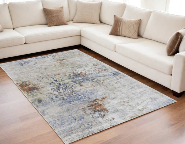 HomeRoots 5' Abstract Area Rug in Red, Blue, and Ivory - Modern Design, Stain Resistant, Durable Cotton Backing 5' X 8' 567703