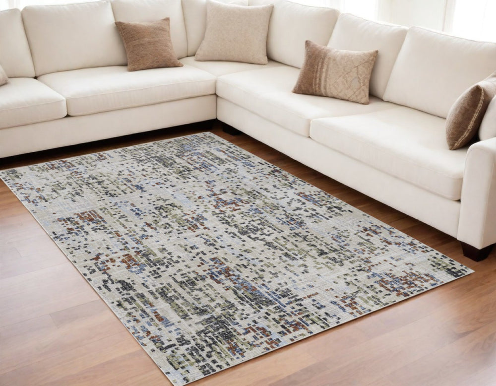 HomeRoots 5' Abstract Area Rug in Ivory, Green, and Blue - Modern Power Loomed, Durable, Kid & Pet Friendly! 5' X 8' 567708
