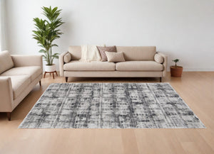 HomeRoots 5' Gray and Ivory Abstract Area Rug – Power Loomed, Durable, Stain-Resistant, Modern Design for Any Room 7' X 10' 567729