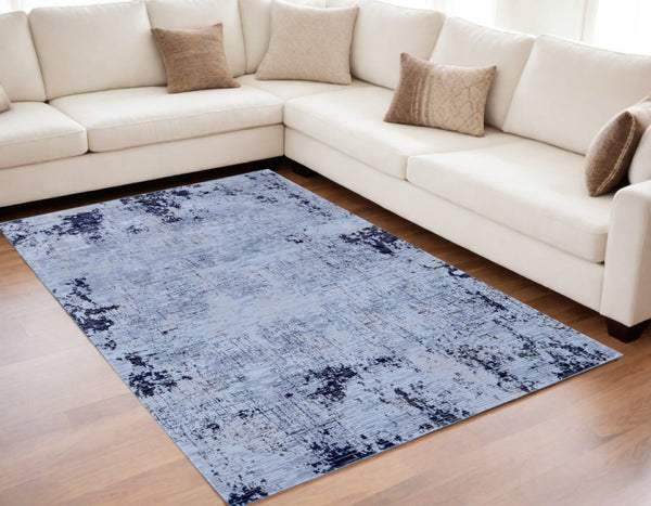 HomeRoots 5' Light Blue and Black Abstract Power Loom Area Rug - Modern, Durable, Stain-Resistant Design for Any Room 5' X 8' 567733