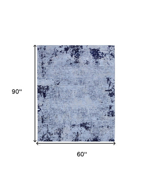 HomeRoots 5' Light Blue and Black Abstract Power Loom Area Rug - Modern, Durable, Stain-Resistant Design for Any Room 5' X 8' 567733
