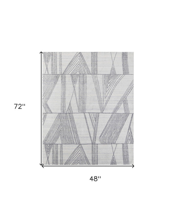 HomeRoots 4' Hand Woven Black and Ivory Abstract Area Rug – Modern Elegance for Cozy Spaces and High Traffic Areas 4' X 6' 567851