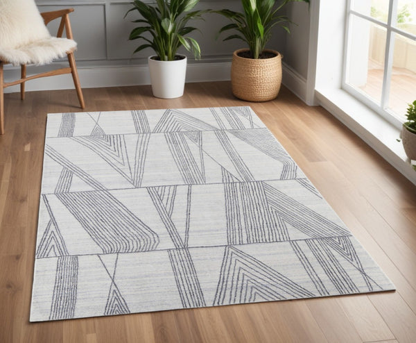 HomeRoots 4' Hand Woven Black and Ivory Abstract Area Rug – Modern Elegance for Cozy Spaces and High Traffic Areas 4' X 6' 567851