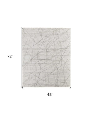 HomeRoots 4' Hand Woven Gray and Ivory Abstract Area Rug – Cozy Texture & Artistry for Modern Spaces 4' X 6' 567857