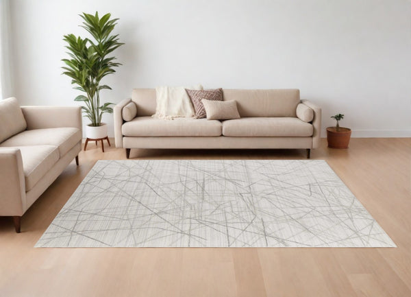 HomeRoots 4' Hand Woven Gray and Ivory Abstract Area Rug – Cozy Texture & Artistry for Modern Spaces 8' X 10' 567859