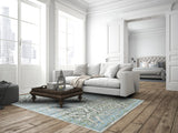 Homeroots 8' Blue Green And Gray Floral Power Loom Worn Faded Round Rug Blue Polypropylene 567899