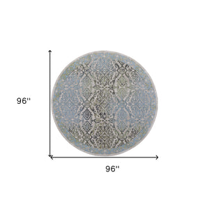 Homeroots 8' Blue Green And Gray Floral Power Loom Worn Faded Round Rug Blue Polypropylene 567899