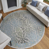 Homeroots 8' Blue Green And Gray Floral Power Loom Worn Faded Round Rug Blue Polypropylene 567899