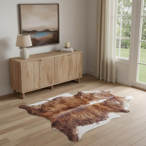 HomeRoots 4' Brown Cowhide Animal Print Area Rug - Rustic Charm Meets Modern Style for Any Room Decor 567902