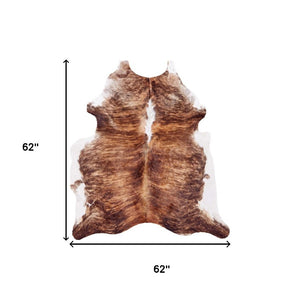 HomeRoots 4' Brown Cowhide Animal Print Area Rug - Rustic Charm Meets Modern Style for Any Room Decor 567902