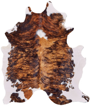 HomeRoots 4' Brown Cowhide Animal Print Power Loom Area Rug – Stylish, Durable, and Easy to Maintain for Any Room 567903