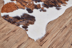HomeRoots 4' Brown Cowhide Animal Print Power Loom Area Rug – Stylish, Durable, and Easy to Maintain for Any Room 567903