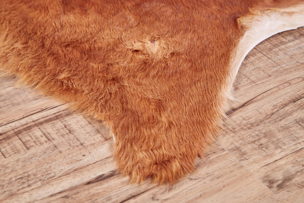 HomeRoots 4' X 5' Brown Cowhide Animal Print Area Rug - Chic Power Loom Design for Modern Living Spaces 567904