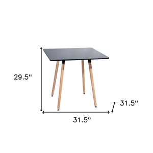 HomeRoots 32" Stylish Black and Natural Wood Square Dining Table for Small Spaces, Modern Aesthetic & Versatility 568205