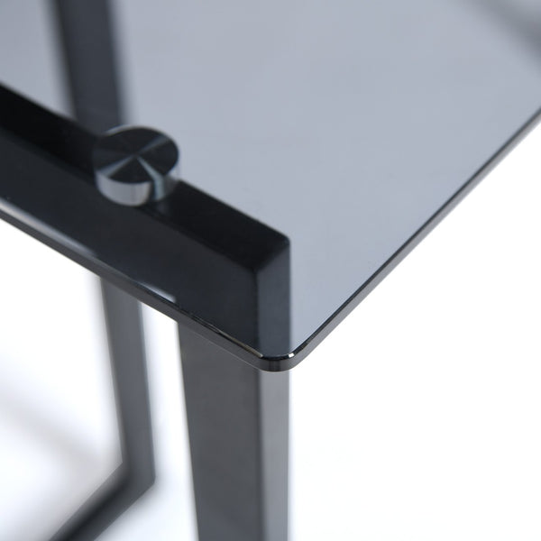 HomeRoots 55" Smoky Gray Glass Dining Table with Black Metal Sled Base - Modern Elegance for Any Space 568211