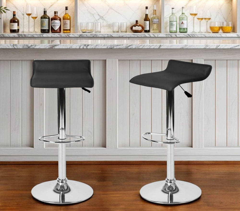 Homeroots Set Of Two Black And Silver Faux Leather And Metal Low Back Adjustable Height Swivel Bar Chairs   568245