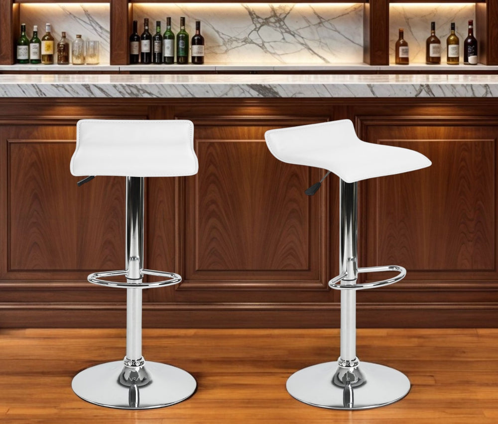 Homeroots Set Of Two White And Silver Faux Leather And Metal Low Back Adjustable Height Swivel Bar Chairs   568246