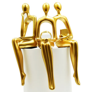 HomeRoots Set of Three Gold Resin People Sculptures - Elegant Tabletop Accents for Modern & Classic Decor 568346