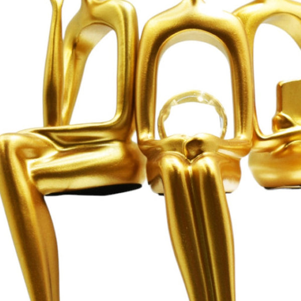 HomeRoots Set of Three Gold Resin People Sculptures - Elegant Tabletop Accents for Modern & Classic Decor 568346